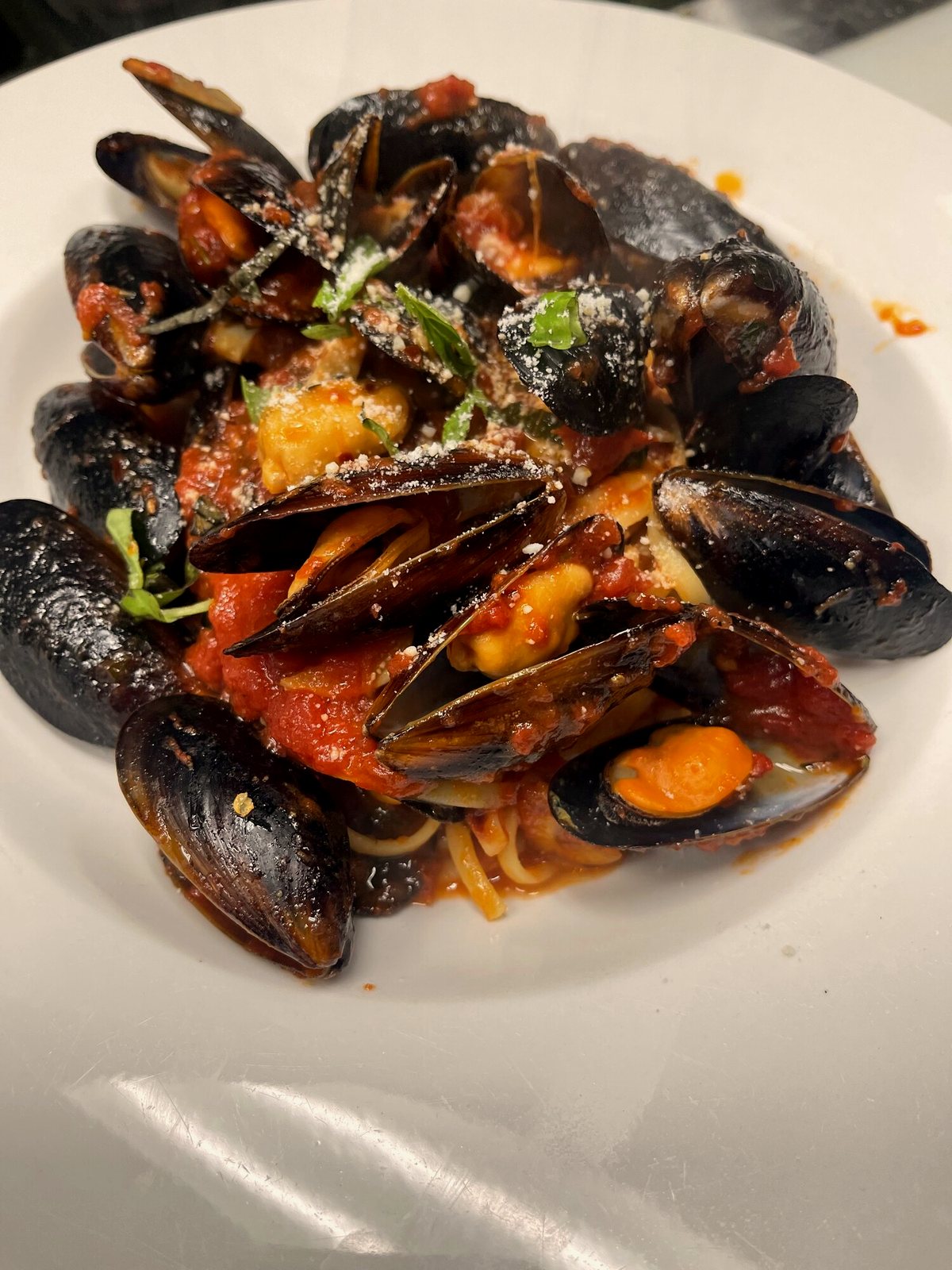 Mussels fra diavolo in spicy tomato sauce with basil at SOLO