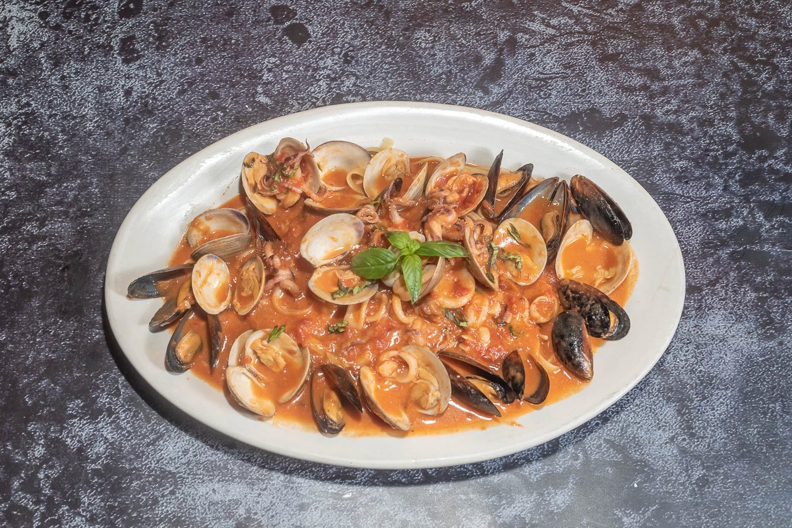 Linguine with clams and mussels in a light tomato sauce